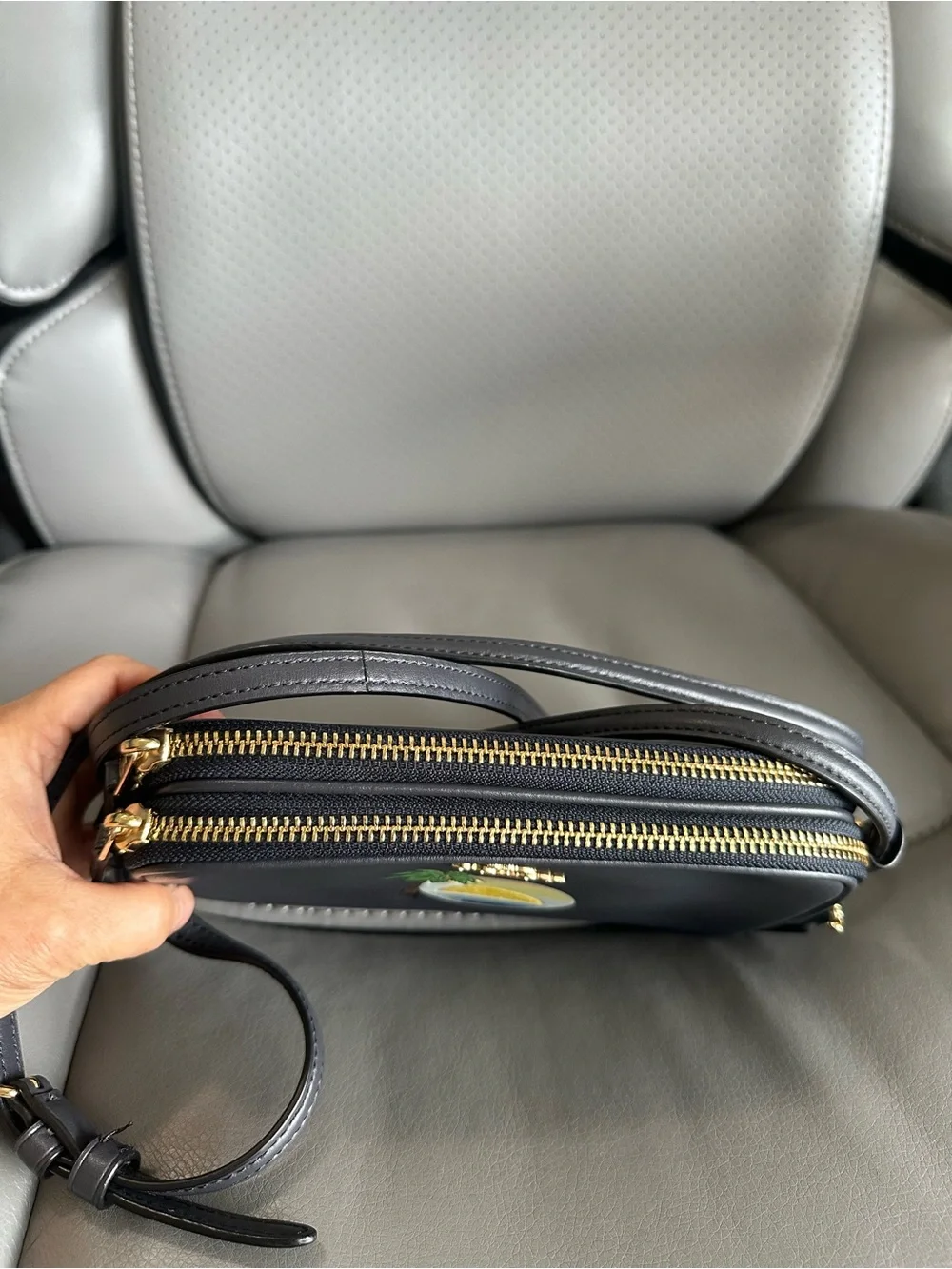 Coach sleek black